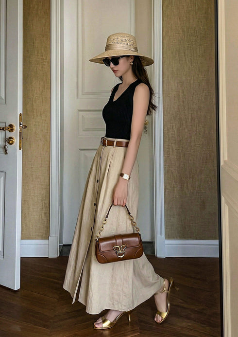 Black knit-paneled A-line maxi dress