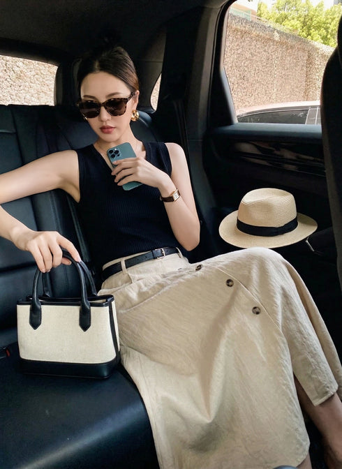 Black knit-paneled A-line maxi dress